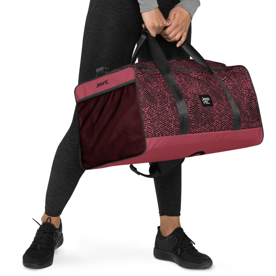 pink duffle bag berry and black fingerprint  right front